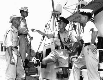 Marine Police inspector briefing village patrol duties in 1964